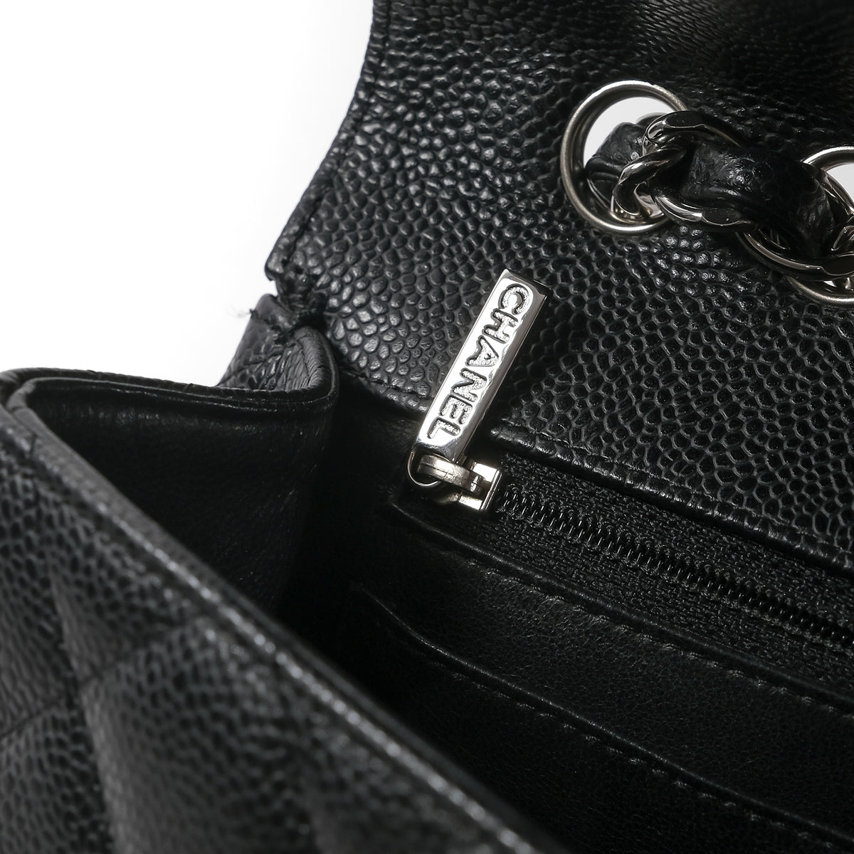 Chanel_Black_Caviar_Jumbo_Classic_Flap_Handbag_1