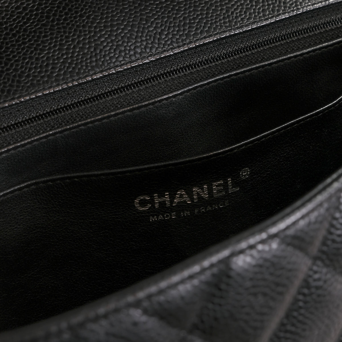 Chanel_Black_Caviar_Jumbo_Classic_Flap_Handbag_1